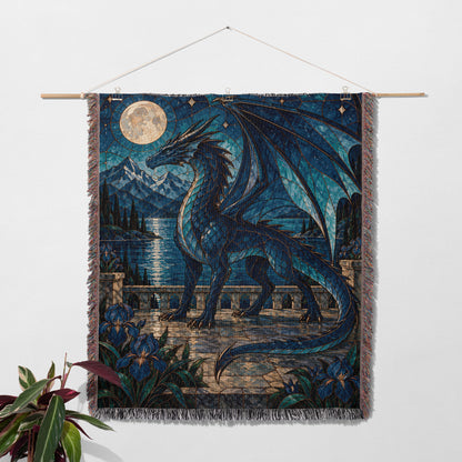 Sgaeyl Woven Throw Blanket hanging on a wall with a plant