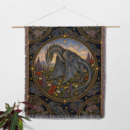 Abraxos in Bloom Stained Glass Woven Throw Blanket hanging on a wall with a plant