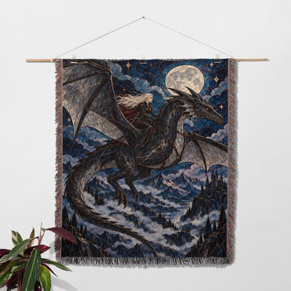 Above the Storm Woven Throw Blanket hanging on a wall with a plant