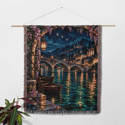 Velaris Woven Throw Blanket hanging on a wall with a plant