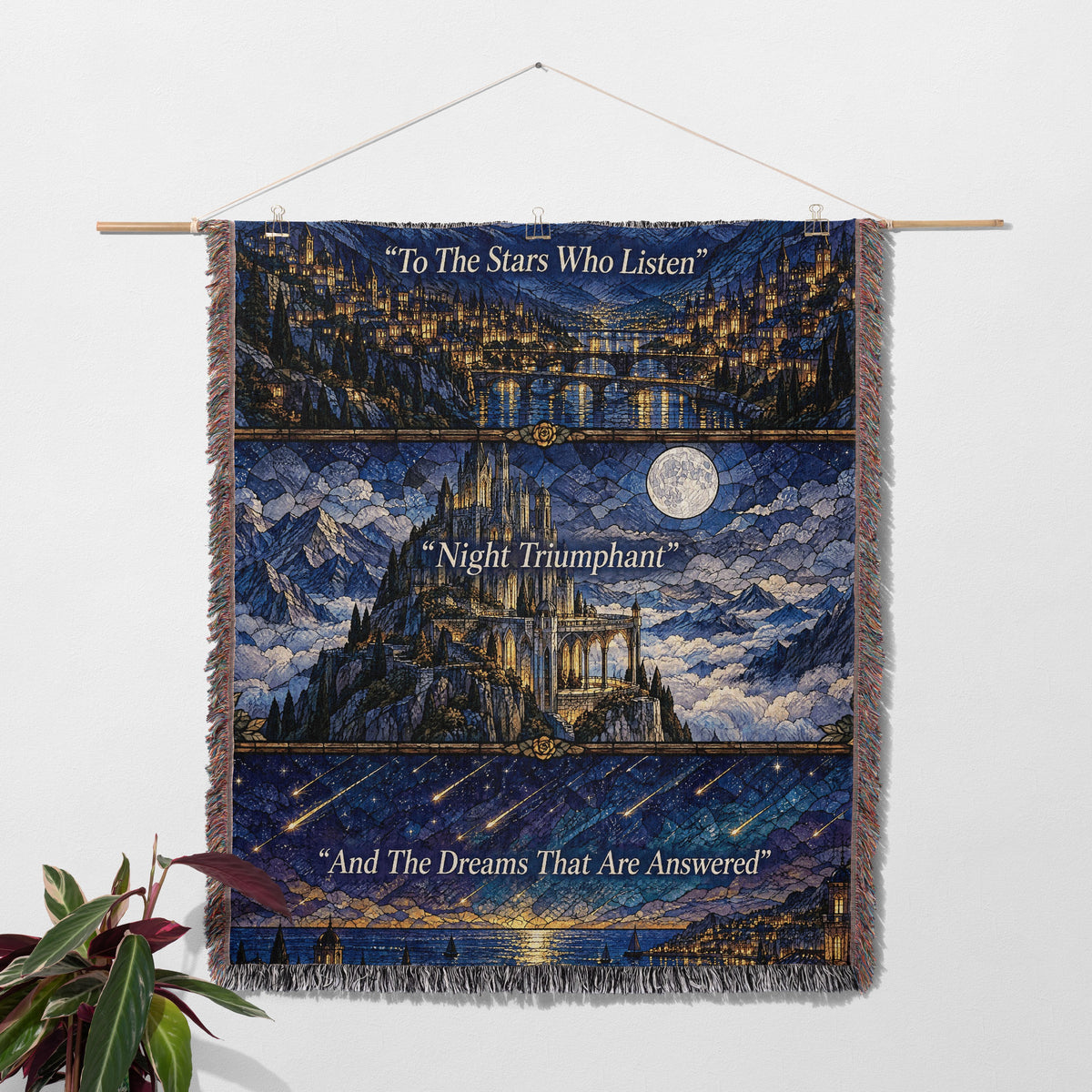 Night Court Stained Glass Woven Throw Blanket hanging on a wall with a plant