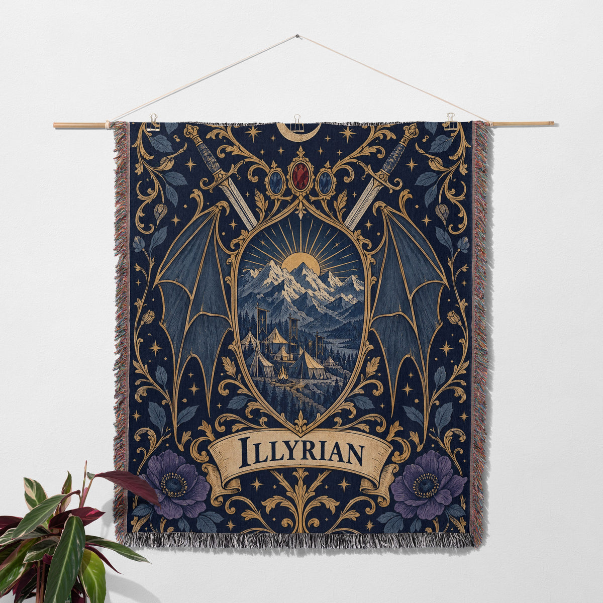 Illyrian Crest Woven Throw Blanket hanging on a wall with a plant
