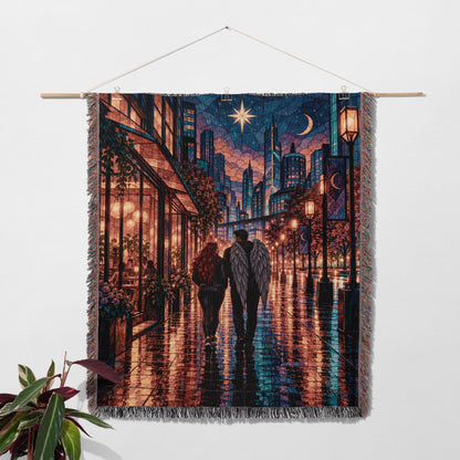 Lunathion Woven Throw Blanket hanging on a wall with a plant