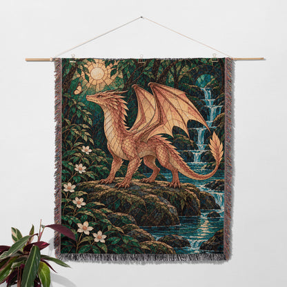 Gold Andarna Woven Throw Blanket hanging on a wall with a plant