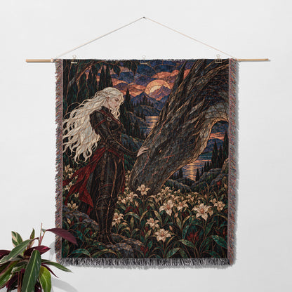 Wildflower Truce Woven Throw Blanket hanging on a wall with a plant