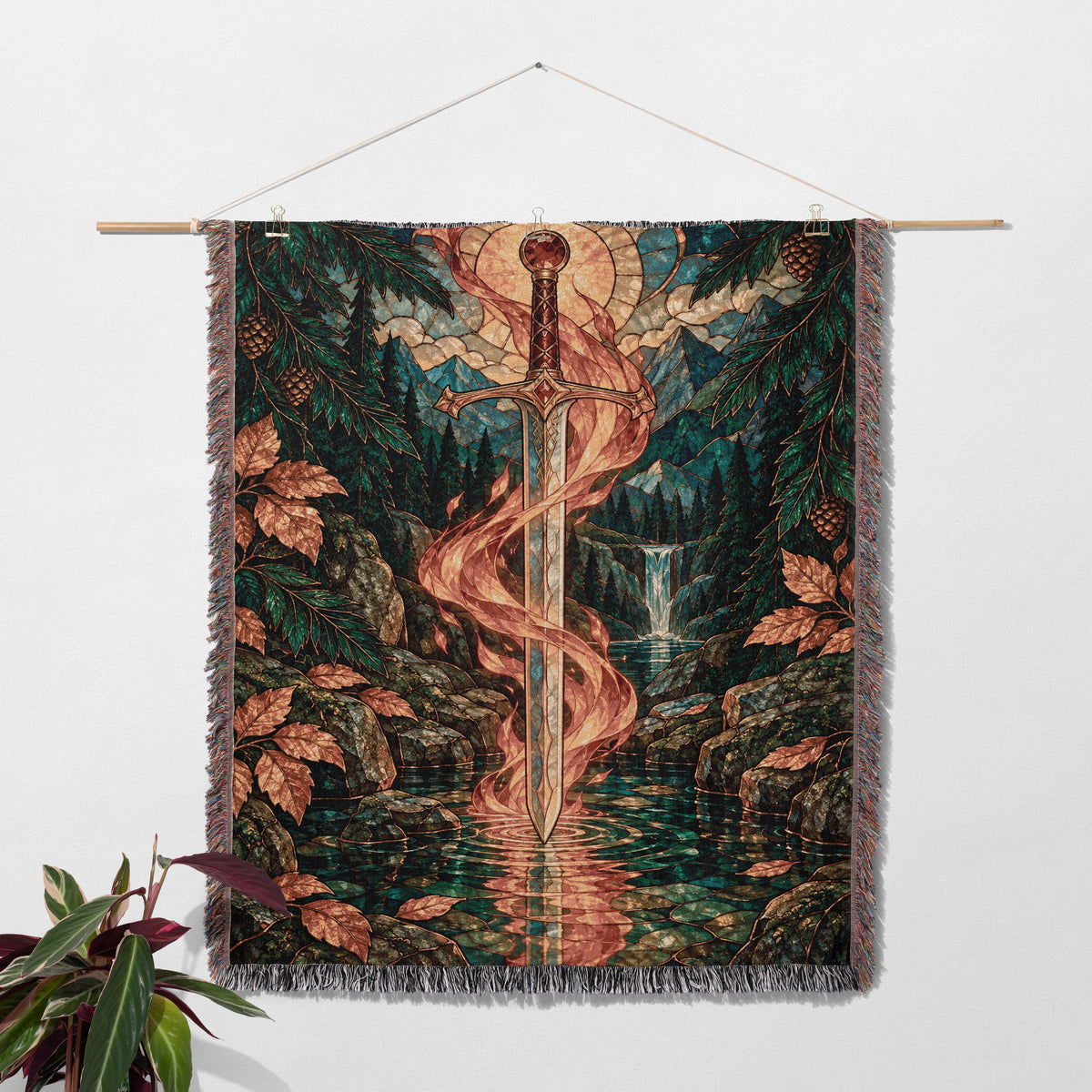 Goldryn Woven Throw Blanket hanging on a wall with a plant