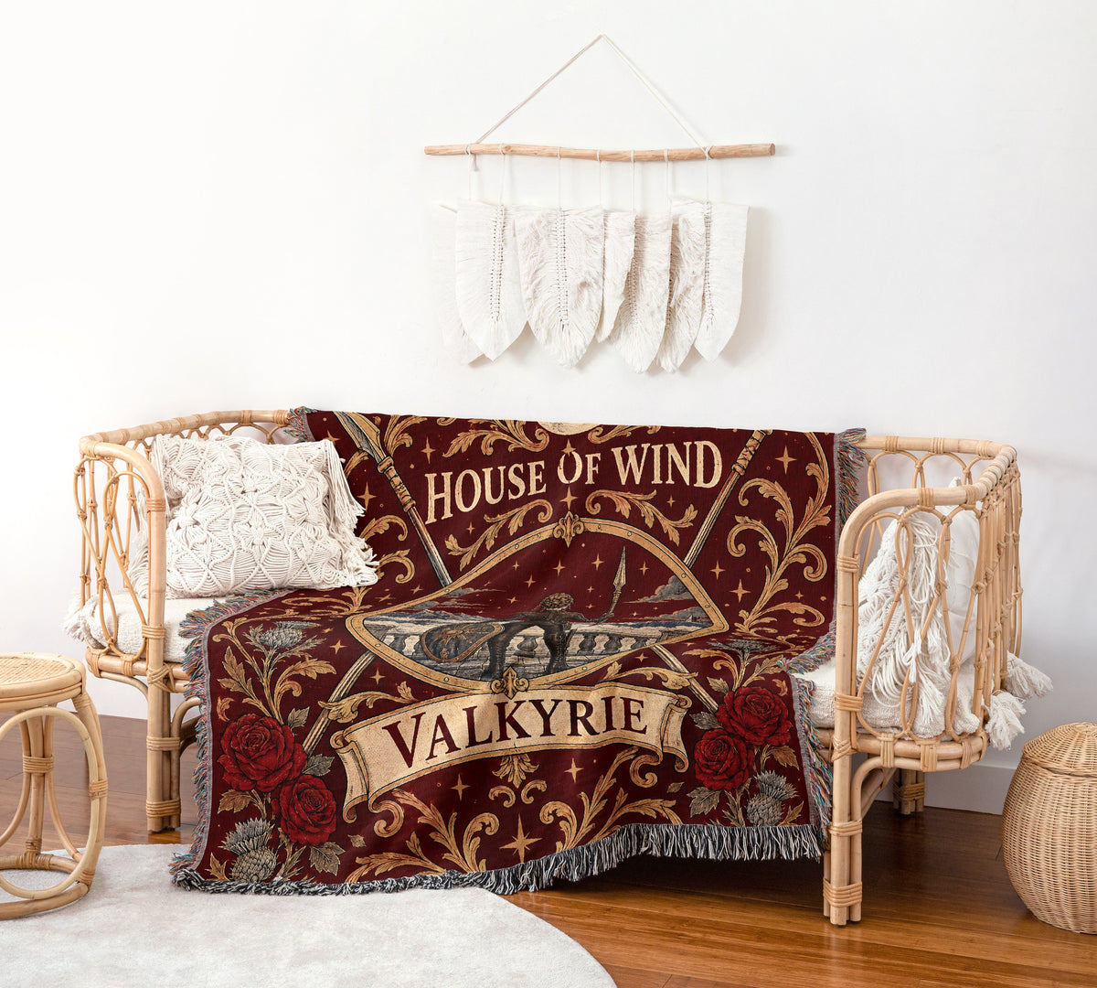 Valkyrie House of Wind Crest Woven Throw Blanket on a rattan chair